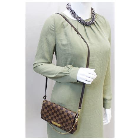 louis vuitton favorite ebene damier pm crossbody bag|Louis Vuitton checkered pattern.